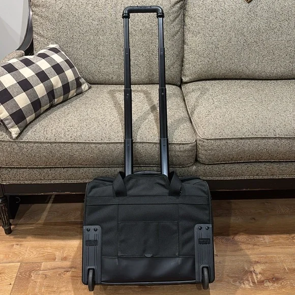 EUC TUMI Black Rolling Duffel Bag Briefcase 2221D3 Carry On